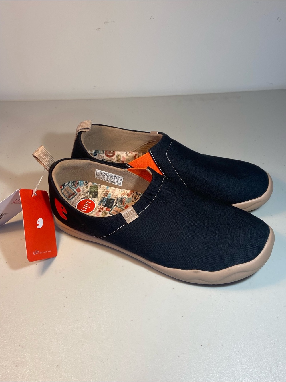 UIN Kids Slip-On Sneakers in Black and Tan with Orange Accent